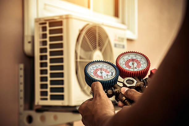 Professional Air Conditioning Service technician working in Taylorstown, PA
